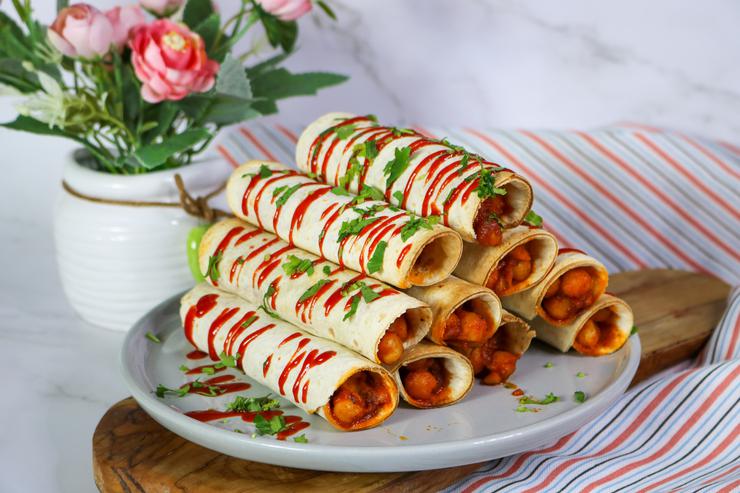 Vegan buffalo chickpea taquitos on plate