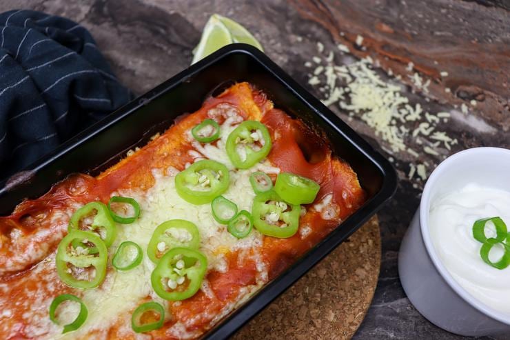 Vegetarian enchilada with spinach in baking pan