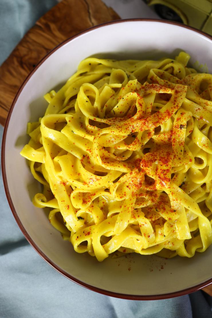 Vegan fettuccine alfredo pasta in bowl top