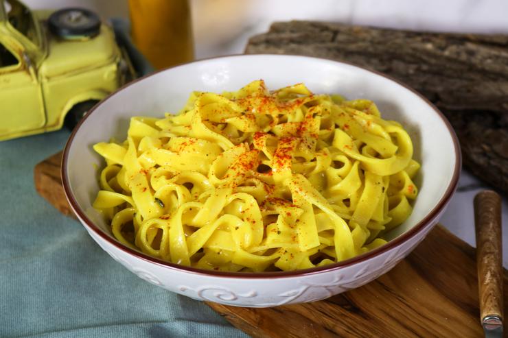 Vegan fettuccine alfredo pasta in bowl