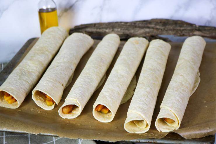 Vegan taquitos rolled before cooking