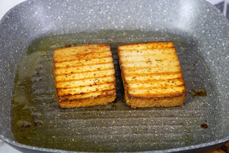 Vegan tofu burgers on grill pan